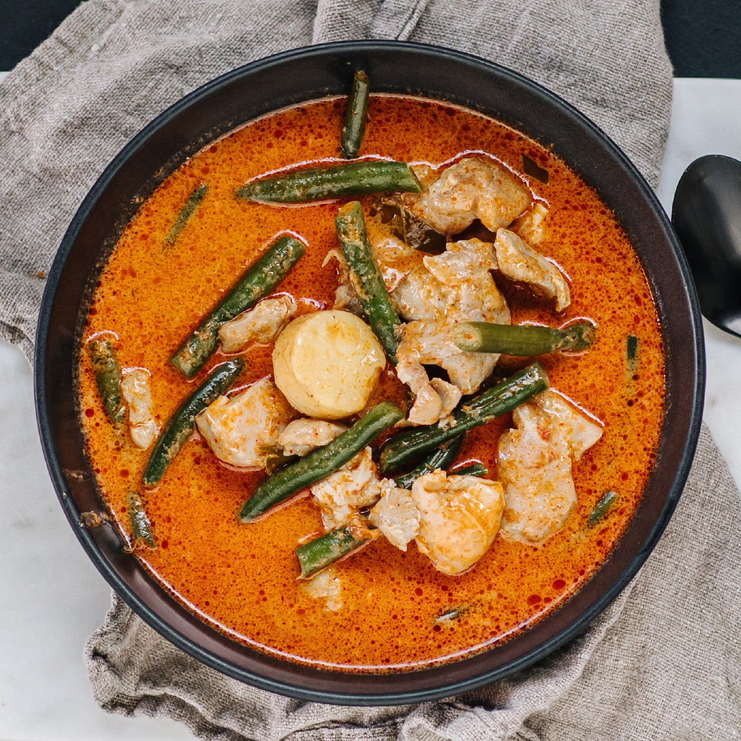 A rich and creamy Thai curry with free-range chicken, potatoes, green beans and lychees.