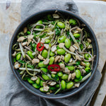 Soba noodle salad with edamame beans, cashews and a lemongrass dressing.