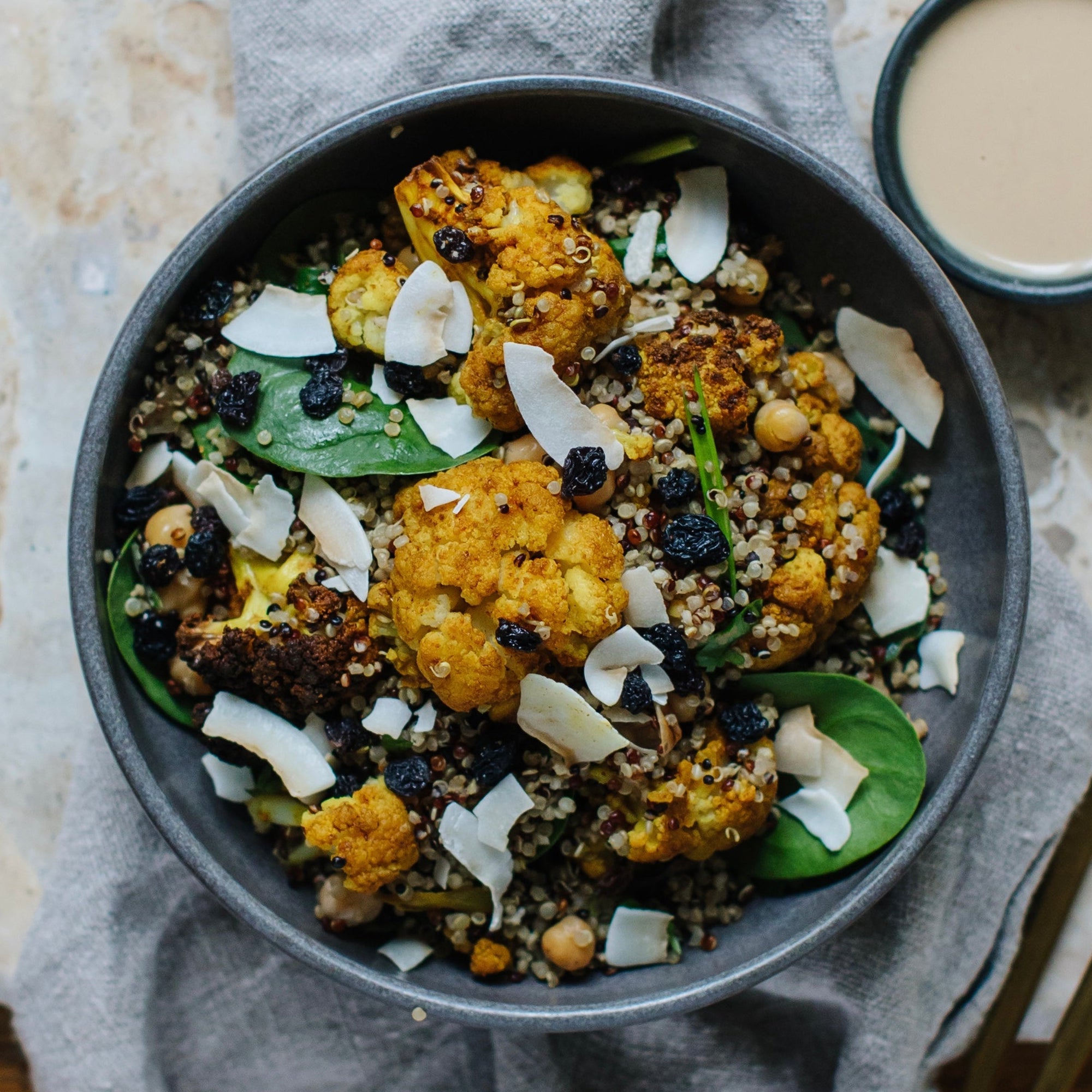 With roasted chickpeas, quinoa and a tahini dressing